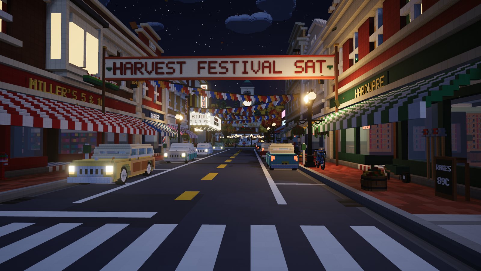Main street in Acorn Falls at night, shop windows lit