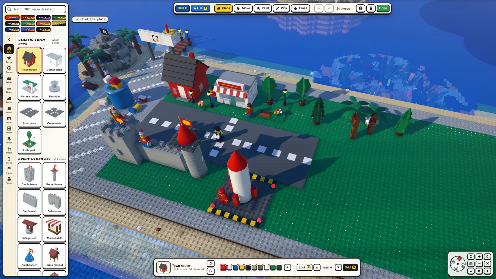 The Brick Builder: a palette of bricks beside a build of a rocket and a small town on a baseplate