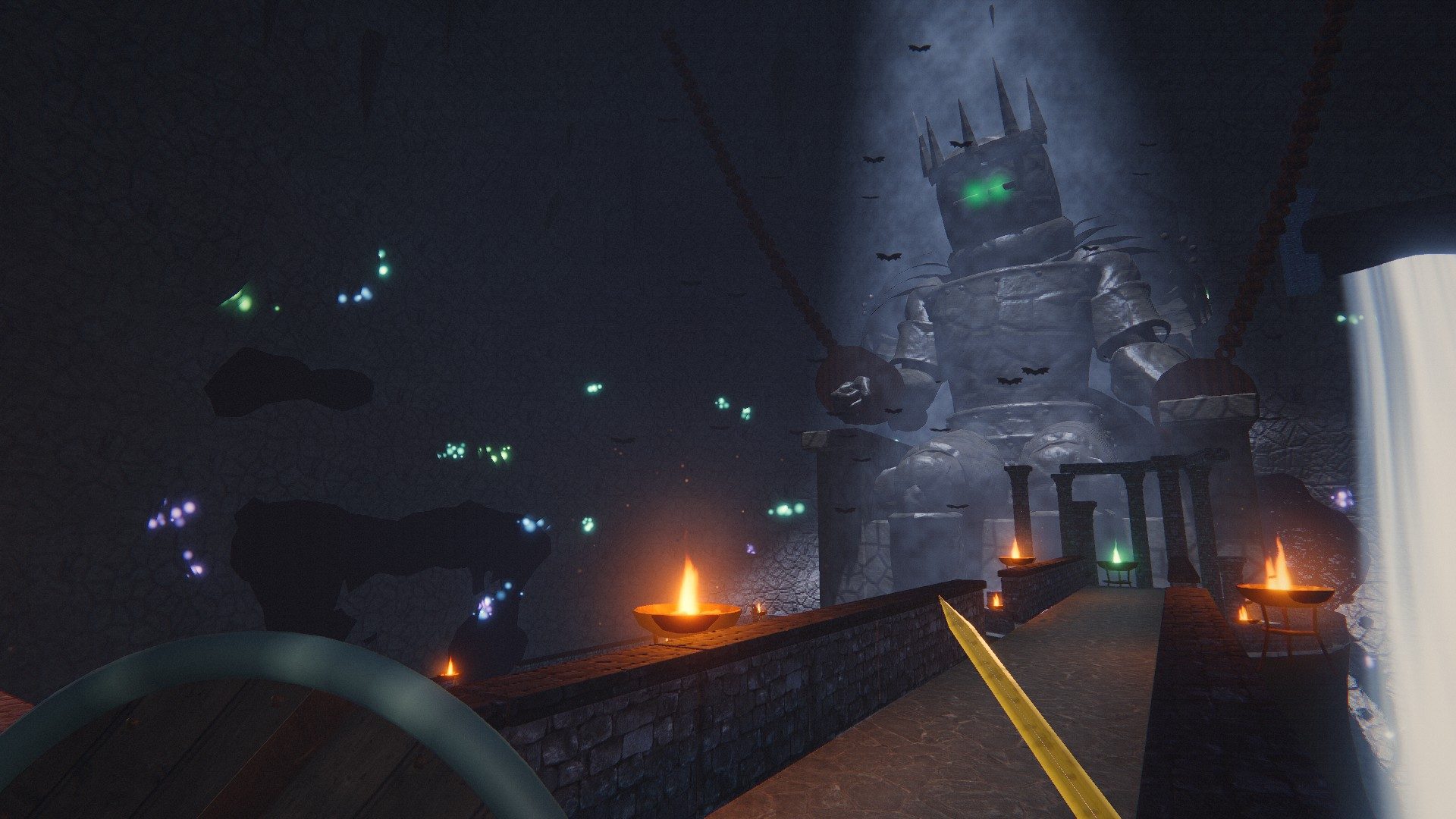 First-person view on a stone viaduct across a vast cavern, toward a colossal crowned statue with glowing green eyes, lit by a shaft of moonlight beside a waterfall