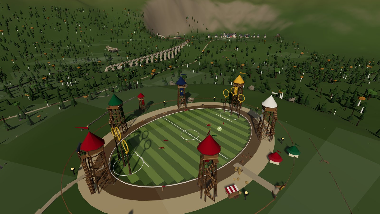 The Quidditch pitch with its six hoops and striped towers, surrounded by trees