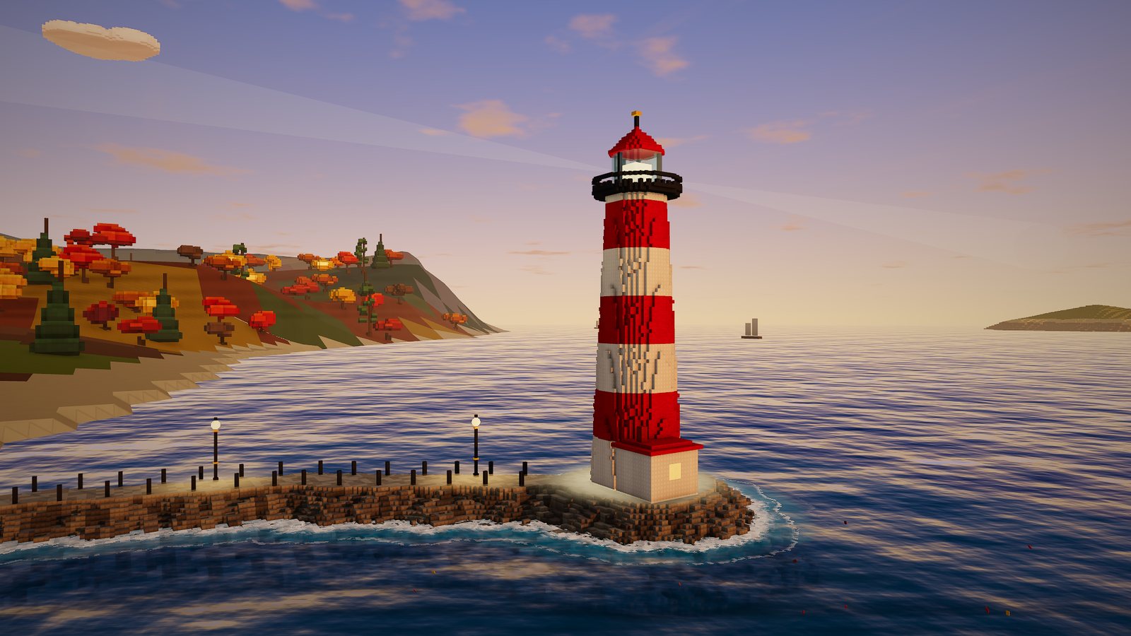 The red and white lighthouse at the end of the breakwater, with the sea and the headland behind