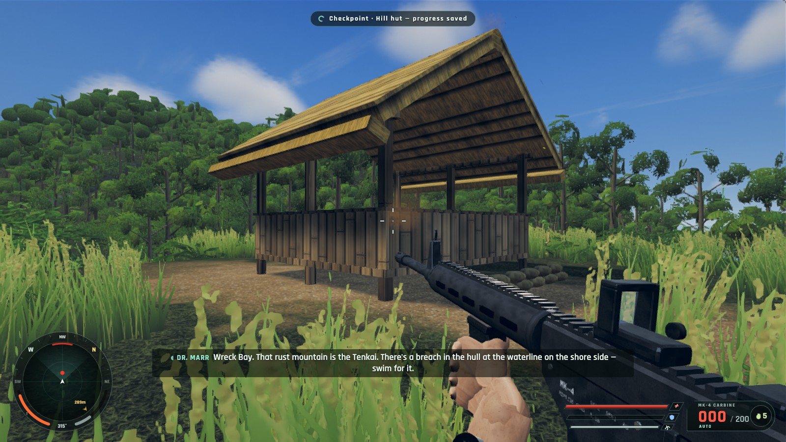 Carbine raised toward a thatched hut in the tall grass