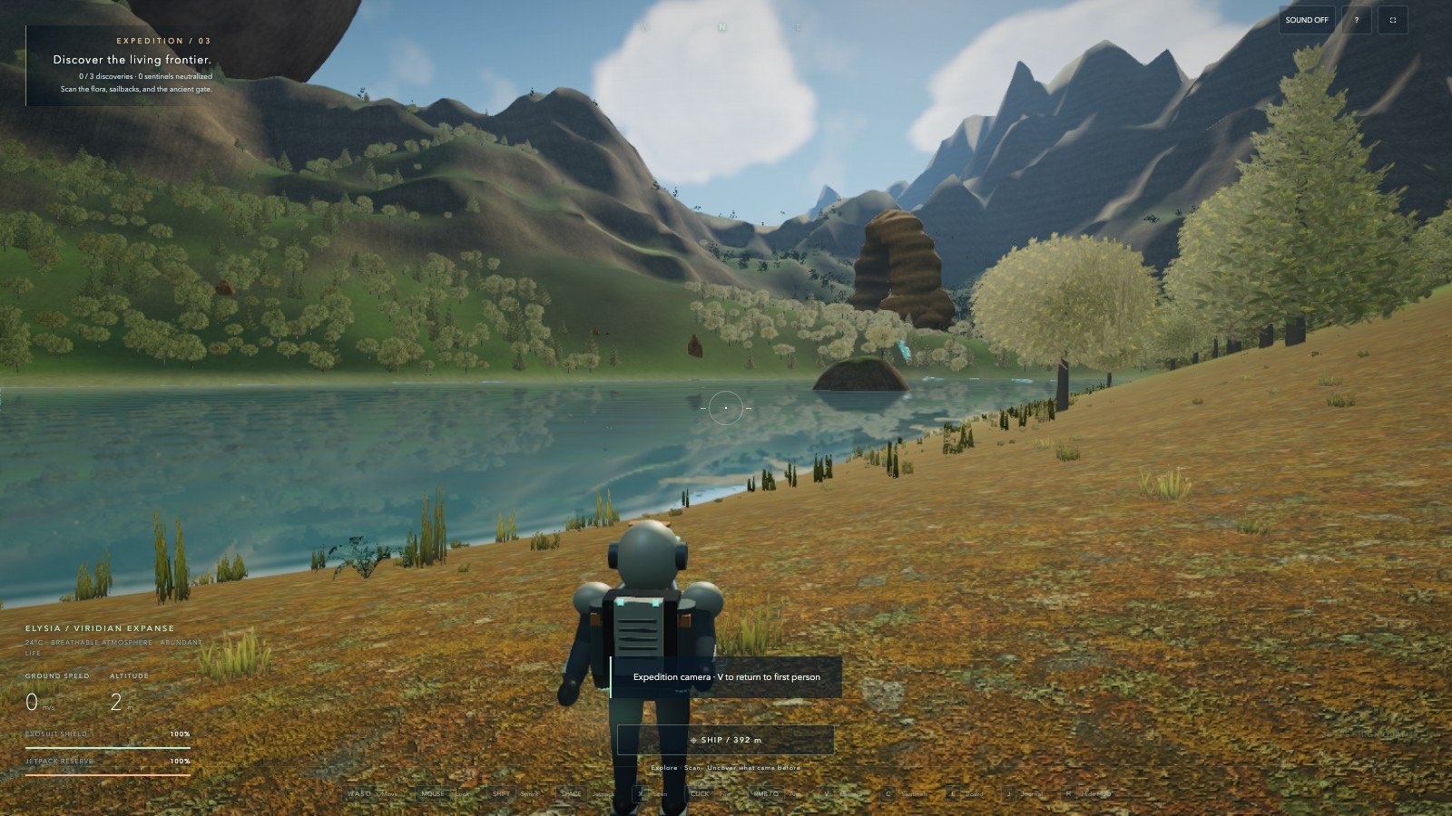 Your astronaut standing on the shore of a lake on Elysia